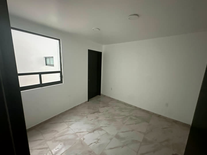 Recámara de planta baja, casa 1.