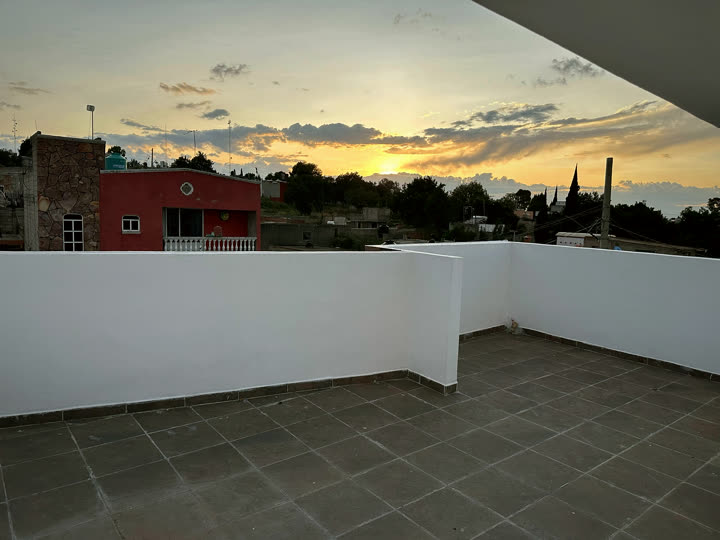Roof garden al atardecer, casa 1.